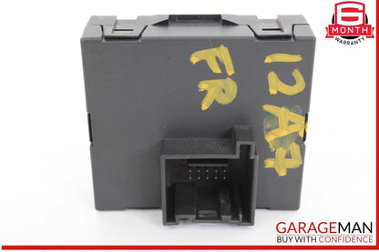 Black plastic component with yellow markings on a white background, featuring the GarageMan logo.