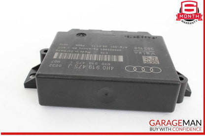 Car part with Audi logo on a white background, featuring 'Garageman' branding.