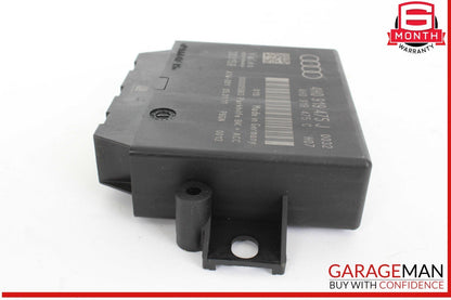 Black automotive part with Audi branding on a white background, featuring Garageman logo.