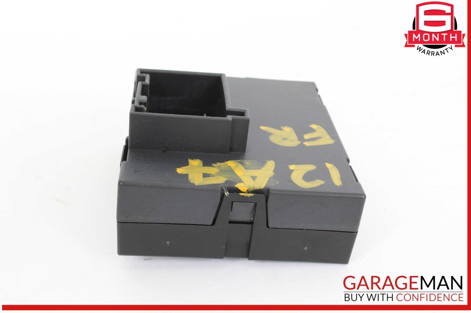Black plastic component with yellow text on a white background, featuring the GarageMan logo.