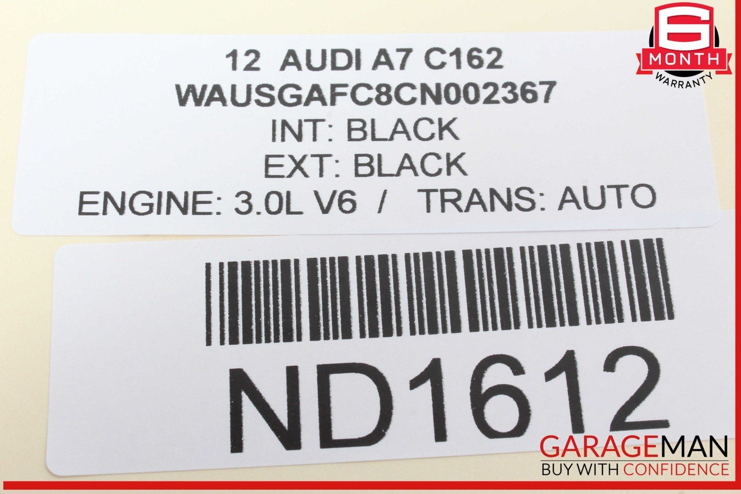Car sticker with Audi vehicle details on a beige background