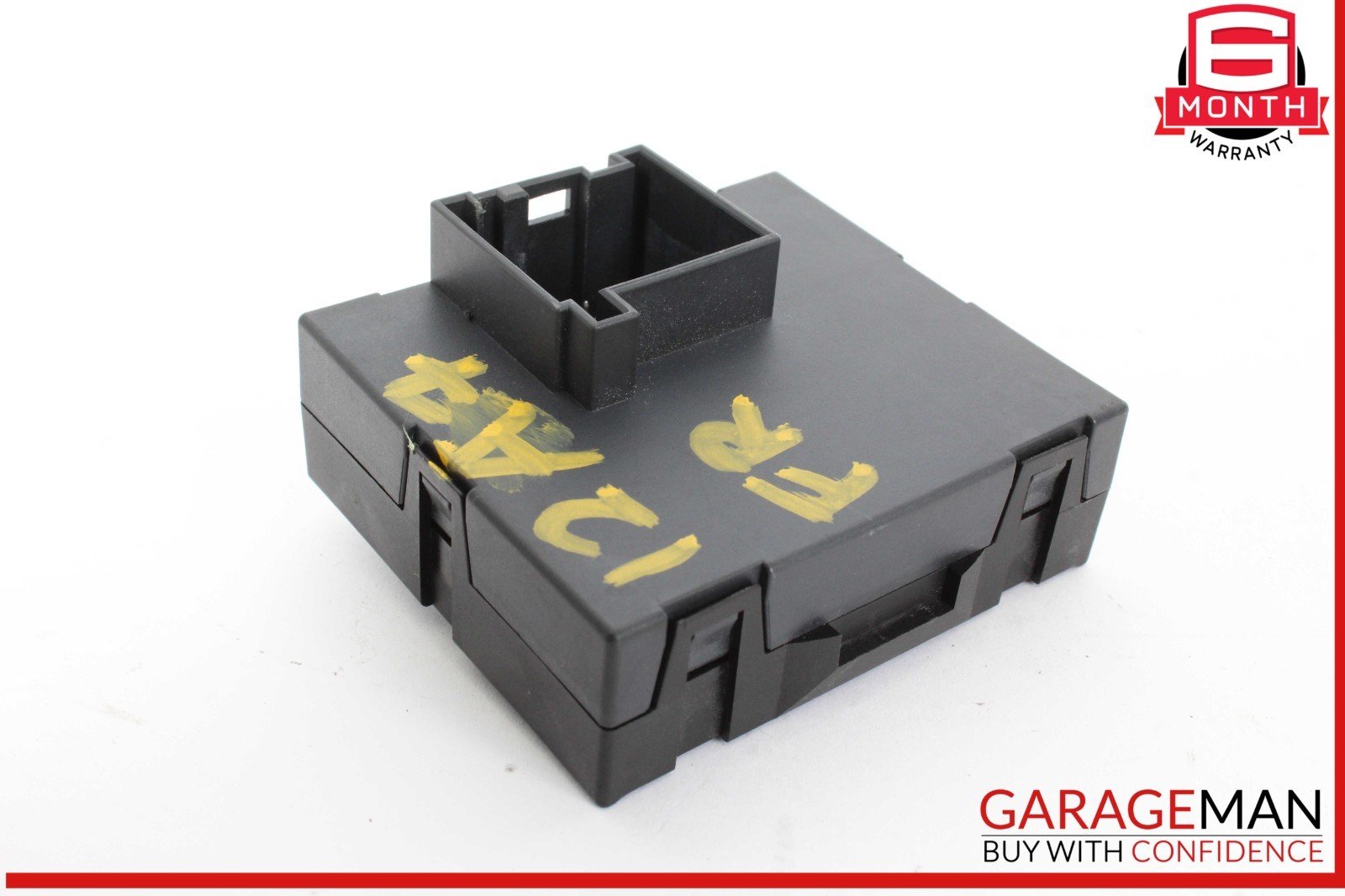 Black plastic component with yellow text on a white background, featuring the GarageMan logo.