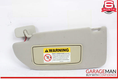 05-09 Volvo S60 Front Left Driver Side Sun Visor Gray OEM