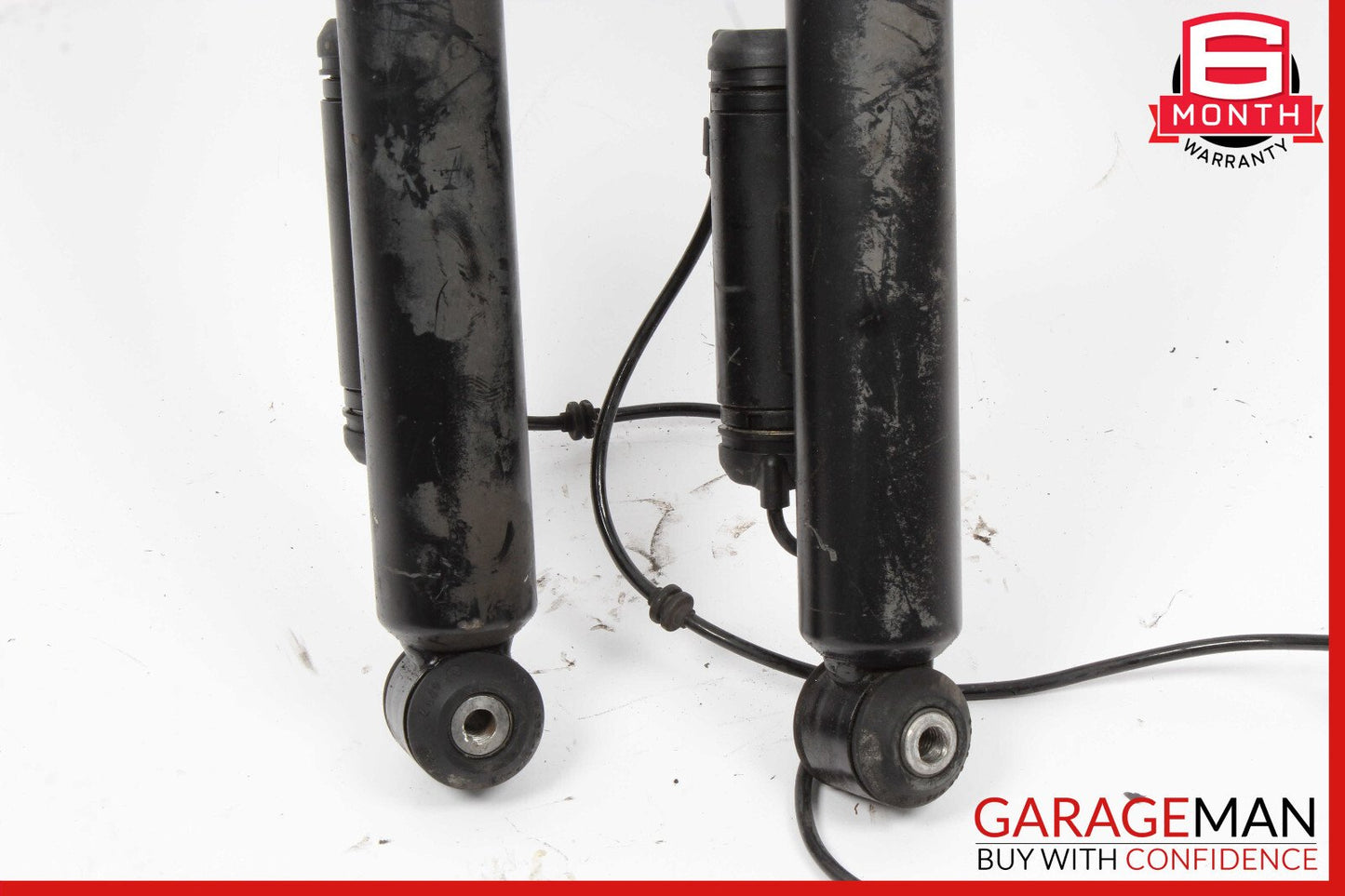 06-11 Mercedes W219 CLS550 Rear Left & Right Side Shock Absorber Strut Set OEM