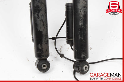 06-11 Mercedes W219 CLS550 Rear Left & Right Side Shock Absorber Strut Set OEM