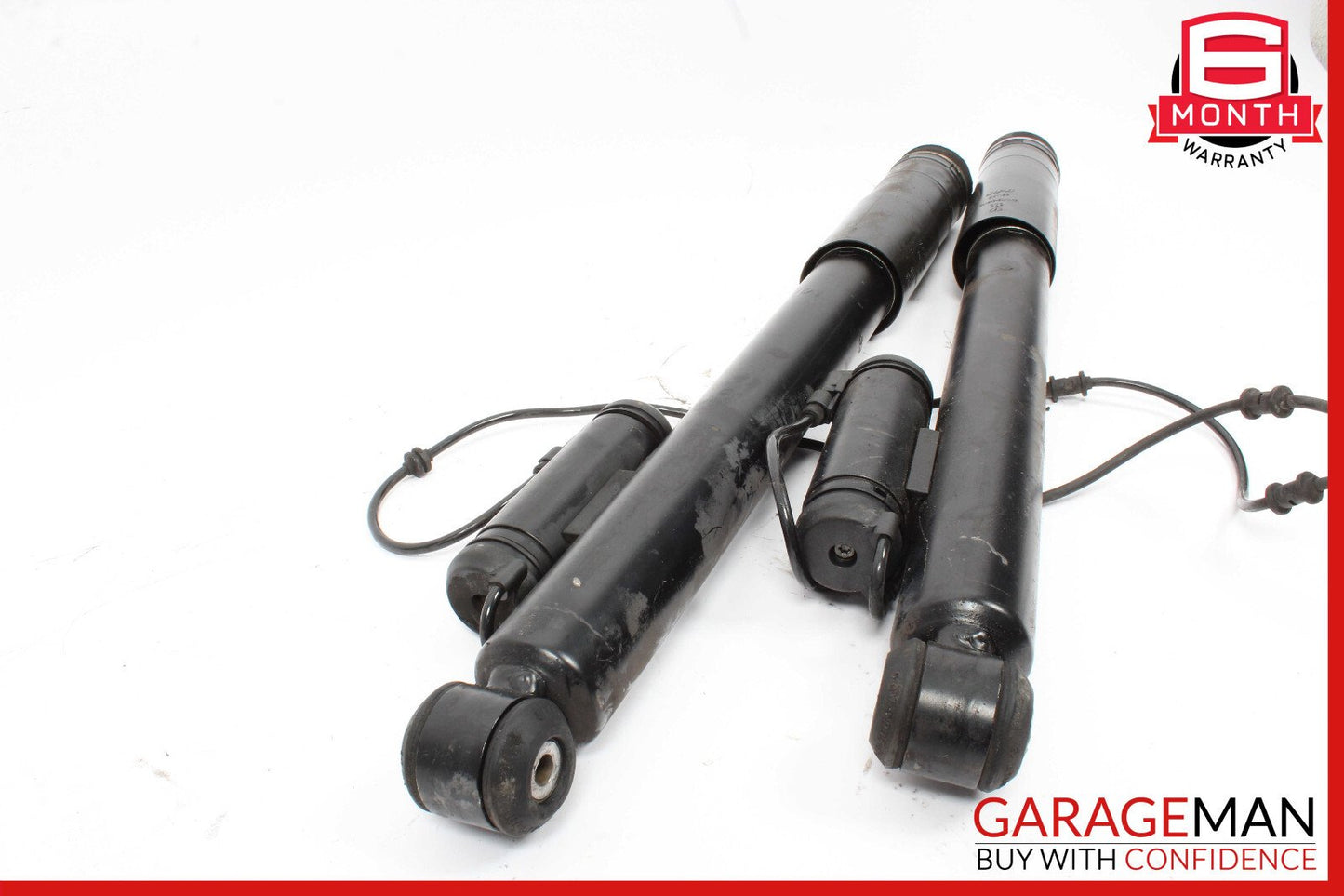 06-11 Mercedes W219 CLS550 Rear Left & Right Side Shock Absorber Strut Set OEM